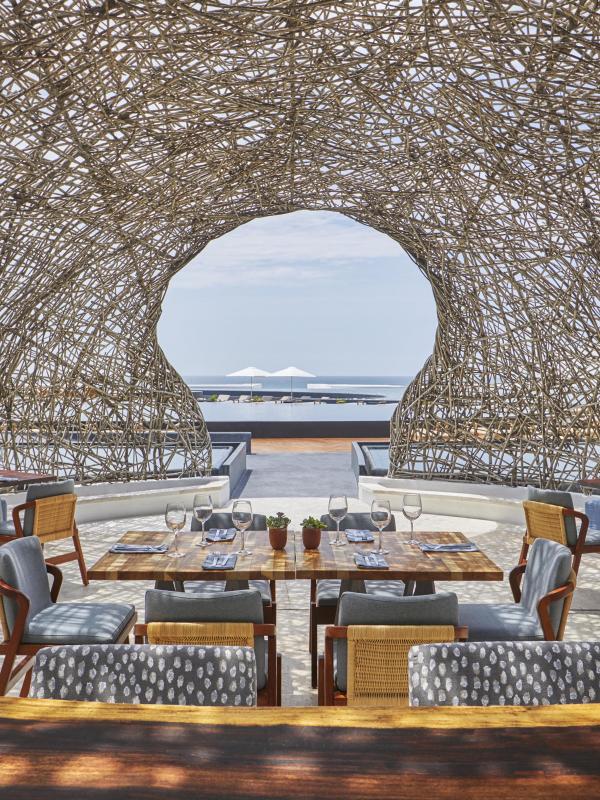 The dining room of Nido restaurant at Viceroy Los Cabos with a nest-like dome roof