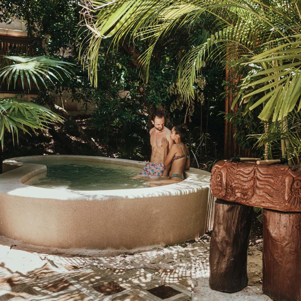 A couple in a spa pool at Riviera Maya