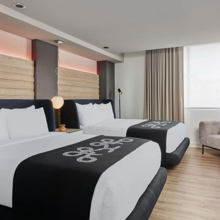 Hotel zena city view room with two queen beds