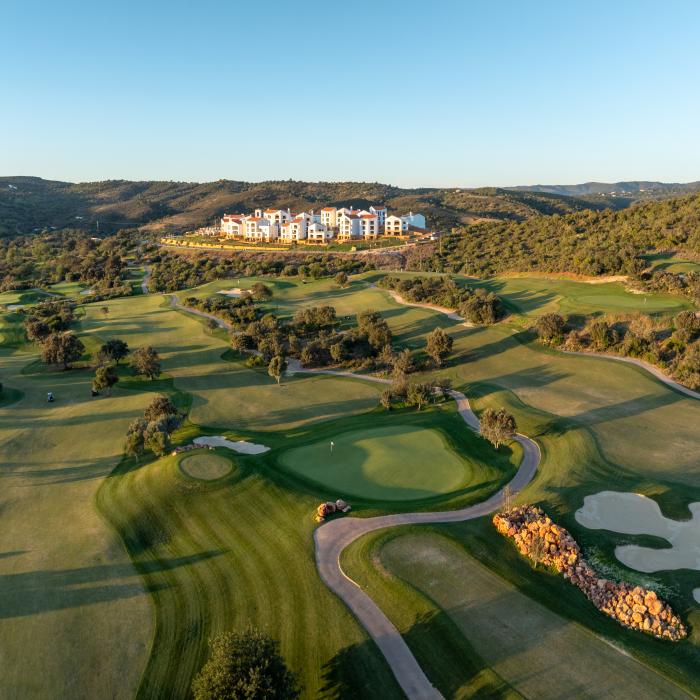 aerial golf course view with ombria algarve in background