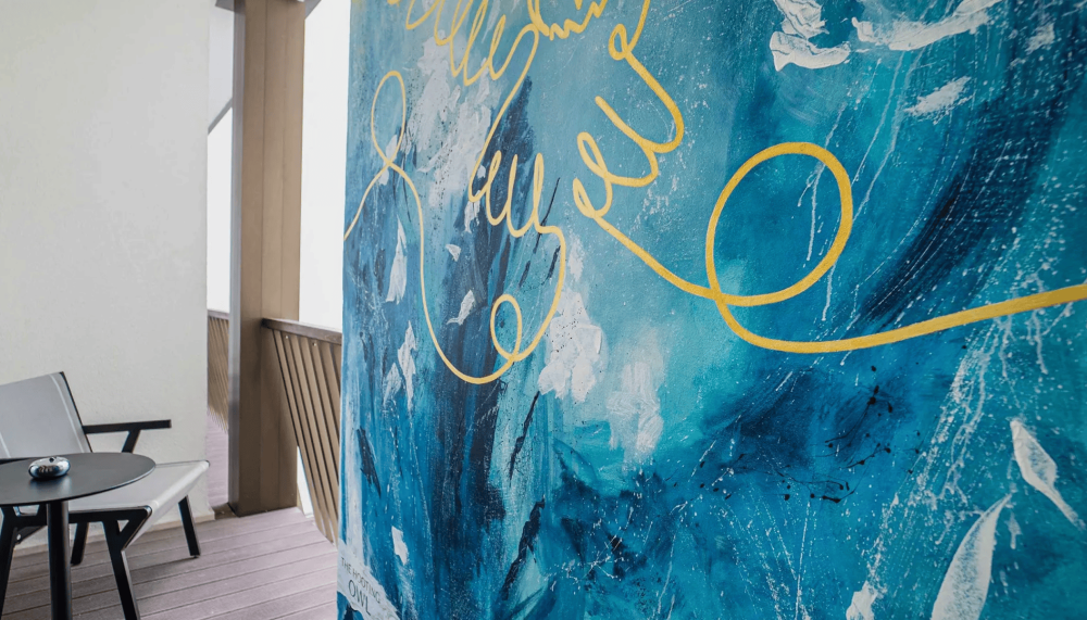 A large piece of canvas abstract art on a balcony at Viceroy Nopaonik Serbia