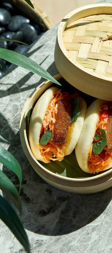 Bao buns in a steam basket