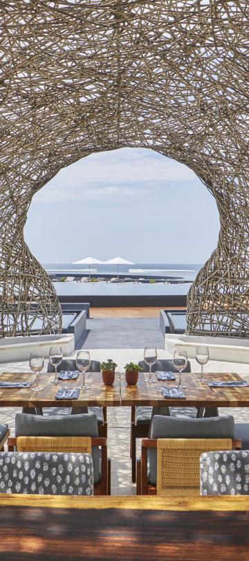 The dining room of Nido restaurant at Viceroy Los Cabos with a nest-like dome roof