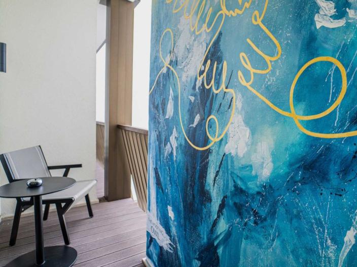 "The Wild Spirits of Kopaonik Mountain", a large blue and white mural with golden swirls overlaid