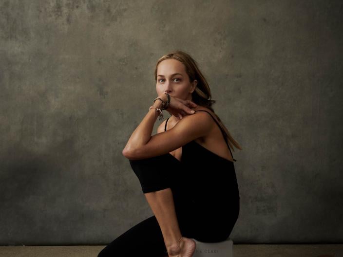 A woman posing with pointed toes
