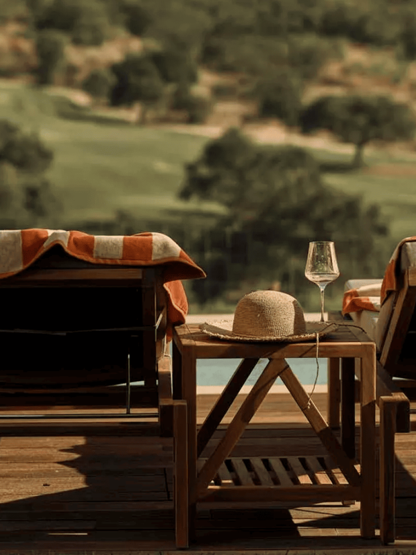 Two lounge chairs overlooking the pool at Ombria Algarve