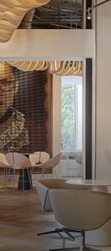 Hotel Zena lobby, featuring a large portrait of Ruth Bader Ginsburg