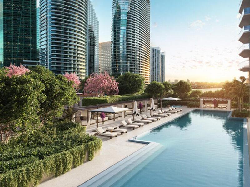 A canal-like pool runs between the buildings of the Viceroy Residences in Brickell